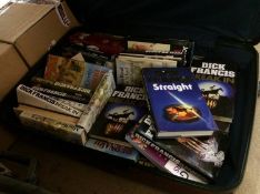 Suitcase containing various books