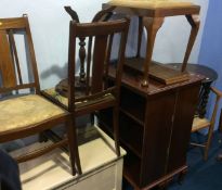 An Edwardian corner chair, pair of bookcases, oak circular table, two Edwardian chairs, cream
