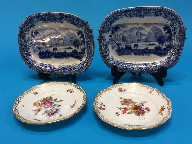 Pair of 'Dresden' hand decorated saucers and a pair of matching mini blue and white meat plates