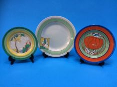 Two Clarice Cliff 'Bizzare' plates and a 'Fantasque' plate