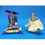 A Coalport figure 'Julia' and a Silvija buss vase and stand