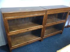 Pair of oak two section stacking bookcases