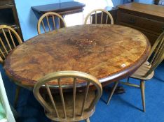 A Victorian inlaid walnut breakfast table