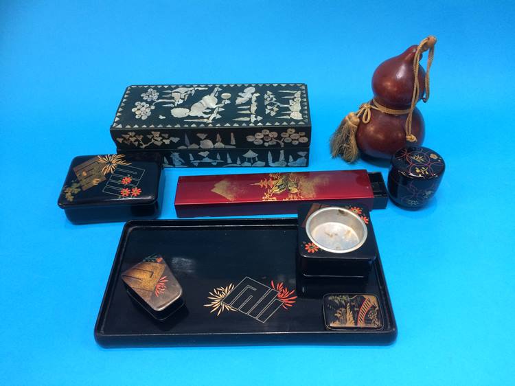 Quantity of assorted Oriental items including chopsticks, papier mache desk tidy etc.