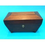 A mahogany Sarcophagus shaped tea caddy