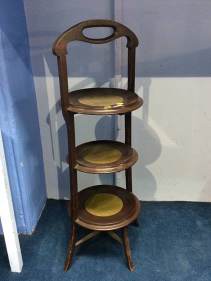 An Edwardian mahogany cake stand