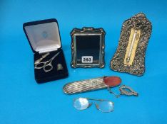 Silver picture frame, silver mounted thermometer, silver spectacle case etc.