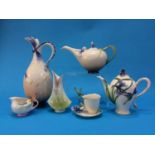 A collection of six boxed Franz porcelain tea pots, cream jugs etc.