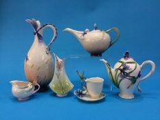 A collection of six boxed Franz porcelain tea pots, cream jugs etc.