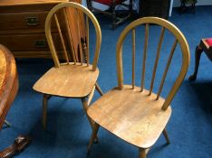 Five Ercol hoop back dining chairs