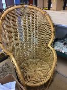 A cane peacock chair