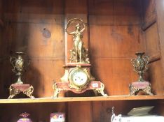 A Continental marble and gilt mantle clock and garniture