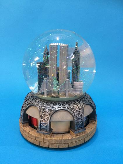 A musical snow globe featuring New York City, Bloomingdales, World Trade Centre and Guggenheim