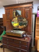 A mahogany two piece bedroom suite, comprising wardrobe and dressing chest