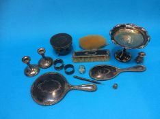 A part silver and tortoishell brush set, various silver napkin rings and a 'Sterling' taza etc.