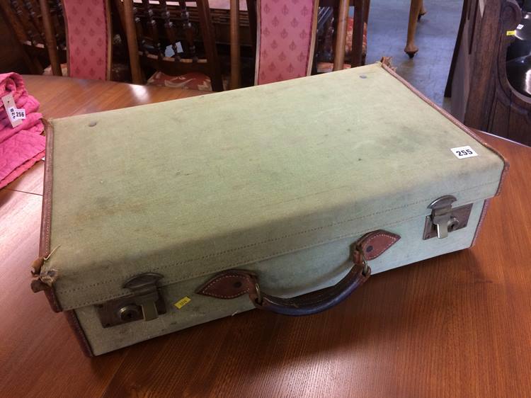 A canvas suit case