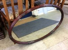 Oval mahogany framed mirror