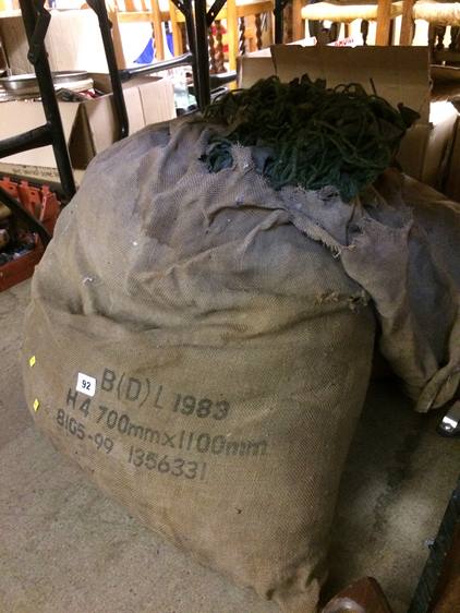 Quantity of camouflage netting in two sacks