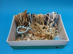 A large quantity of costume jewellery in one box