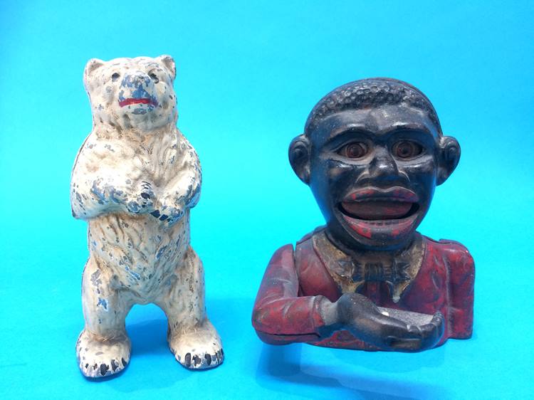 Two cast novelty money banks