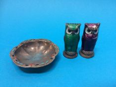A pair of Norwegian enamelled pepper pots and a small enamelled dish