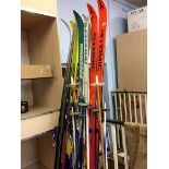 Collection of skis (5) and a pair of poles
