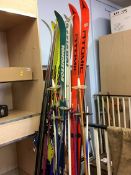 Collection of skis (5) and a pair of poles