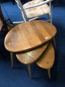 An Ercol nest of pebble tables