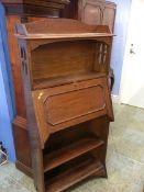 An oak Arts and Crafts style bureau bookcase