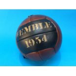 A reproduction leather cased football