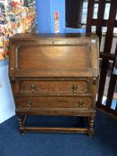 An oak barley twist bureau