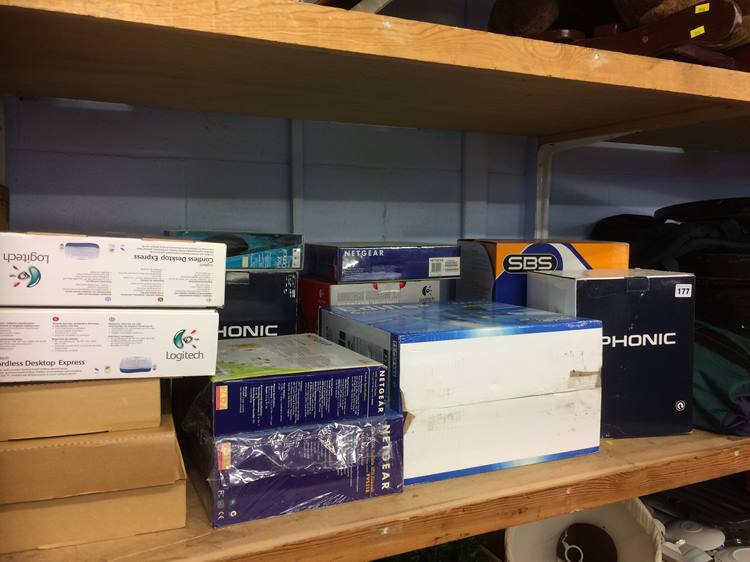 Shelf of assorted boxed electricals