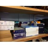 Shelf of assorted boxed electricals