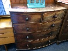 A bow front mahogany chest of drawers