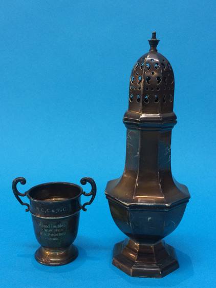 A silver sugar castor and a small silver trophy 4.3oz
