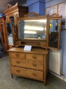 An Edwardian two piece walnut bedroom suite, comprising wardrobe and dressing chest