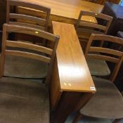Teak table, four chairs and a side cabinet