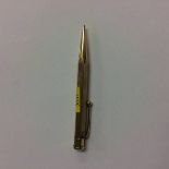 A 9ct gold propelling pencil