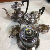 A plated tea set and biscuit barrel