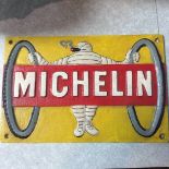 A cast Michelin plaque