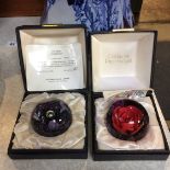Two boxed Caithness paperweights