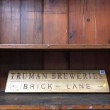 A Truman Breweries wooden plaque