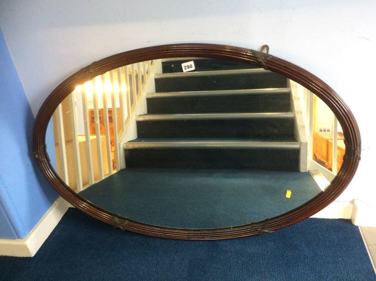 Mahogany framed oval mirror