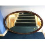 Mahogany framed oval mirror