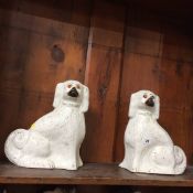 Pair of Staffordshire pot dogs