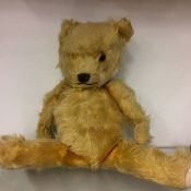 A jointed teddy bear