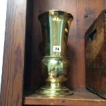 A brass urn