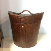 A hat box style waste paper bin