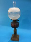 Oil lamp with frosted glass shade