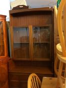 Teak bookcase and yew corner cabinet